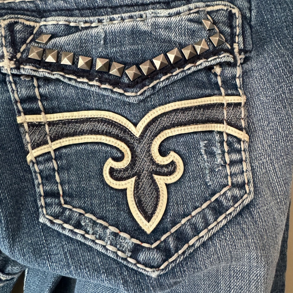 Rock Revival Blue Jeans with Studded Embellishments and Contrast Stitching
